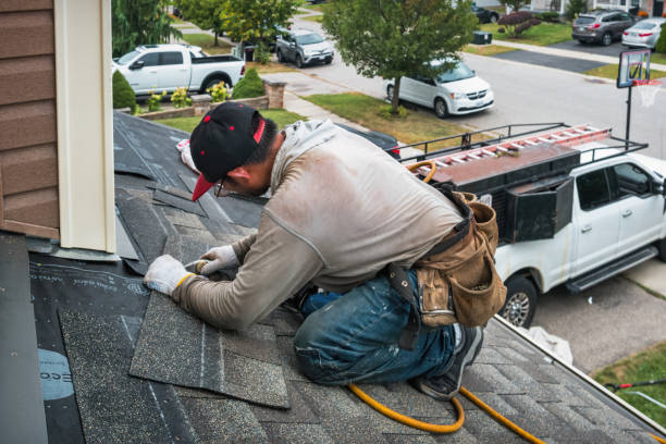 Professional Roofing technician working in Glenarm, IL